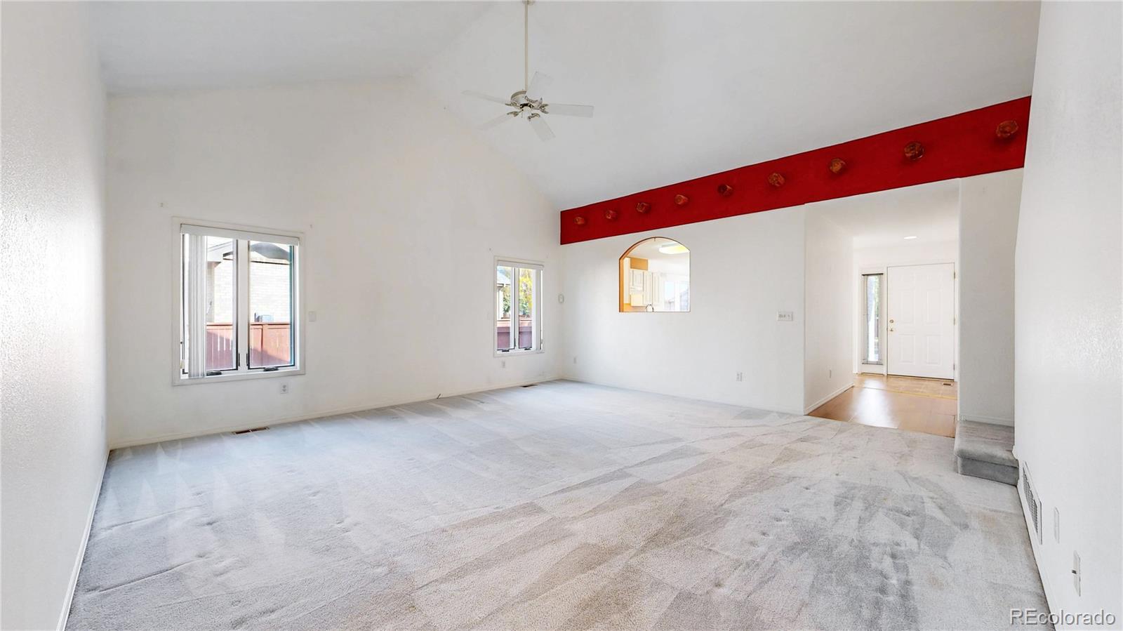 4367 Quail Street Wheat Ridge, CO 80033 - Photo 15 of 50 a view of an empty room with a window