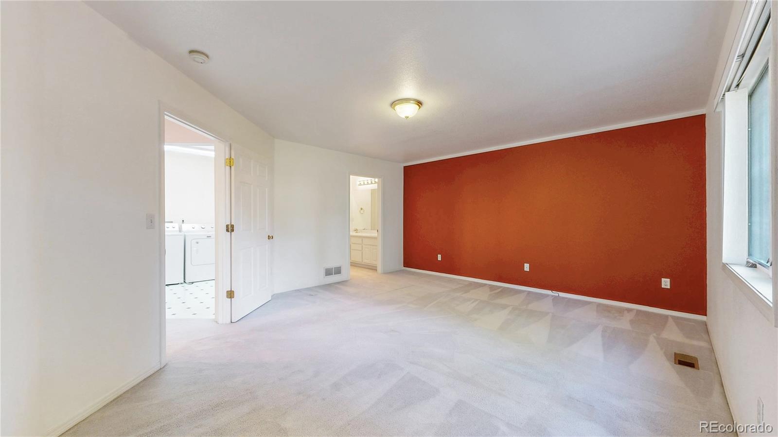 4367 Quail Street Wheat Ridge, CO 80033 - Photo 18 of 50 an empty room with closet area
