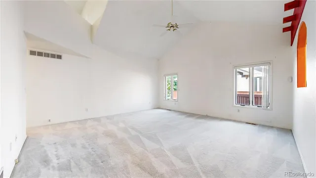 an empty room with windows