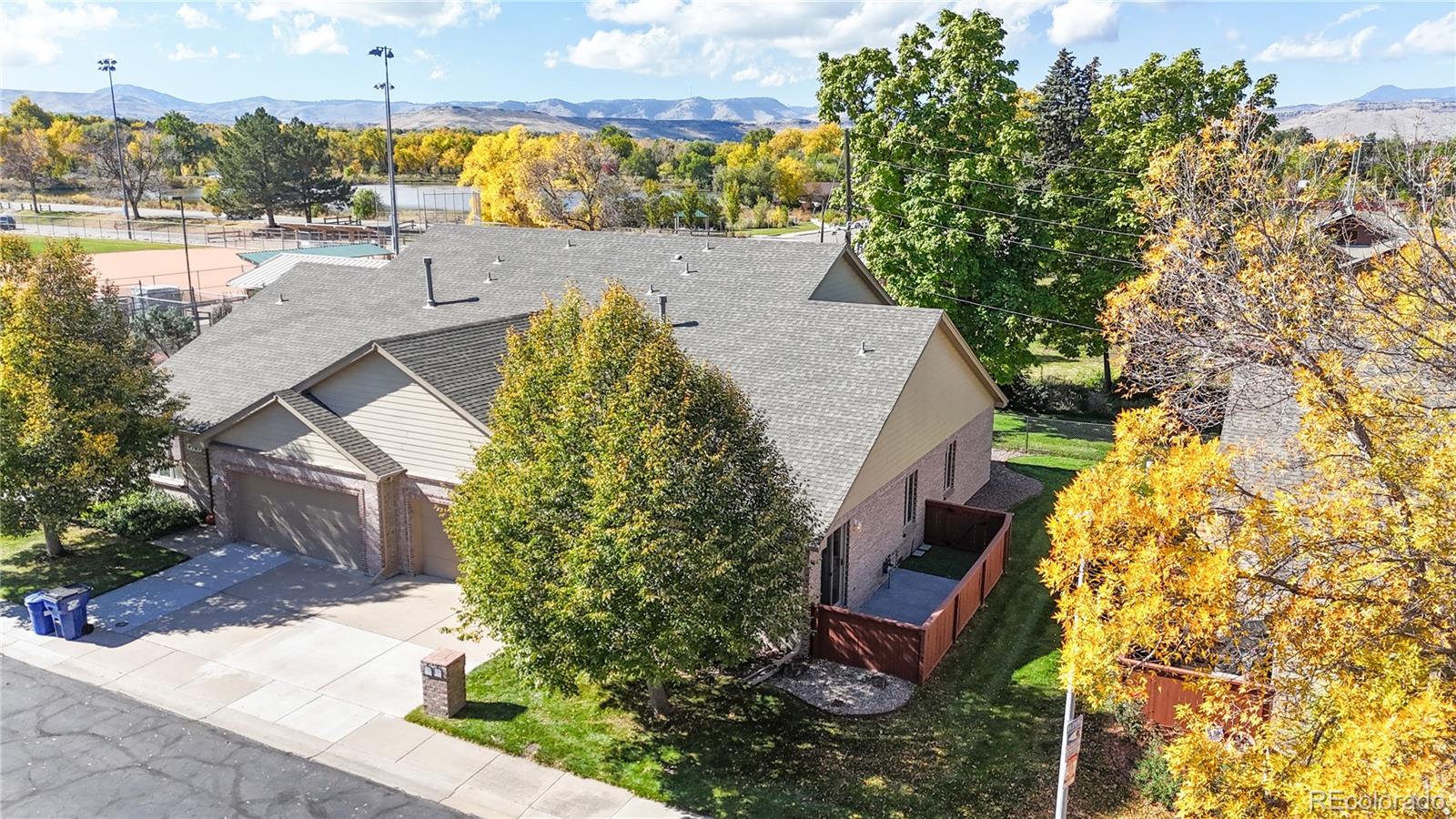 4367 Quail Street Wheat Ridge, CO 80033 - Photo 2 of 50 a view of a swimming pool with a patio
