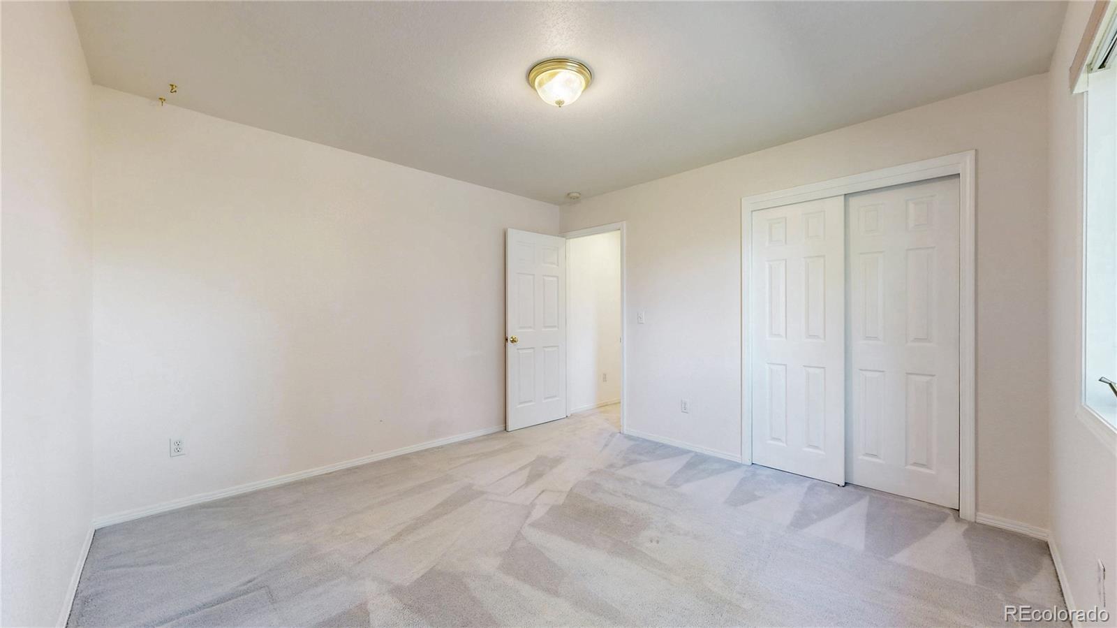 4367 Quail Street Wheat Ridge, CO 80033 - Photo 26 of 50 a view of an empty room