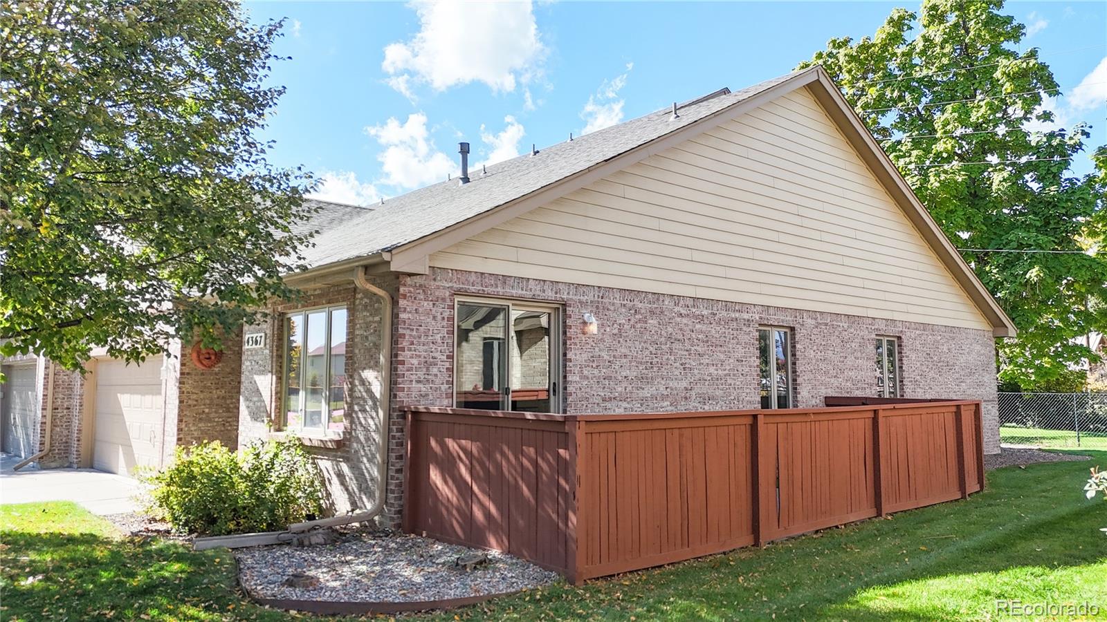 4367 Quail Street Wheat Ridge, CO 80033 - Photo 3 of 50 a view of a house with backyard and garden