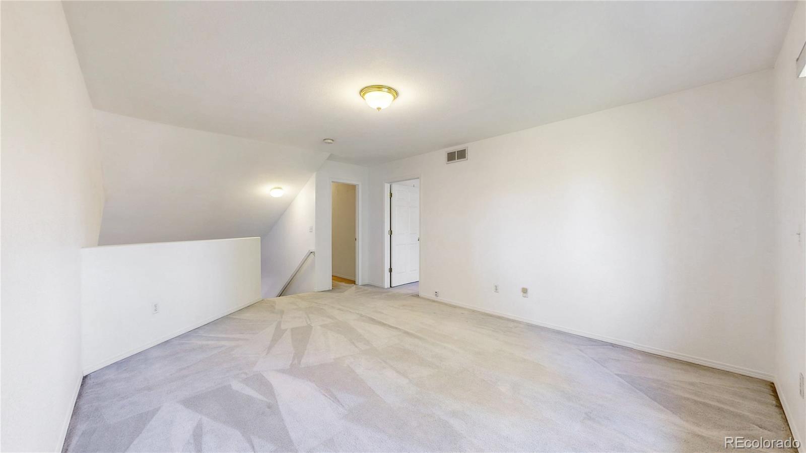 4367 Quail Street Wheat Ridge, CO 80033 - Photo 33 of 50 a view of an empty room