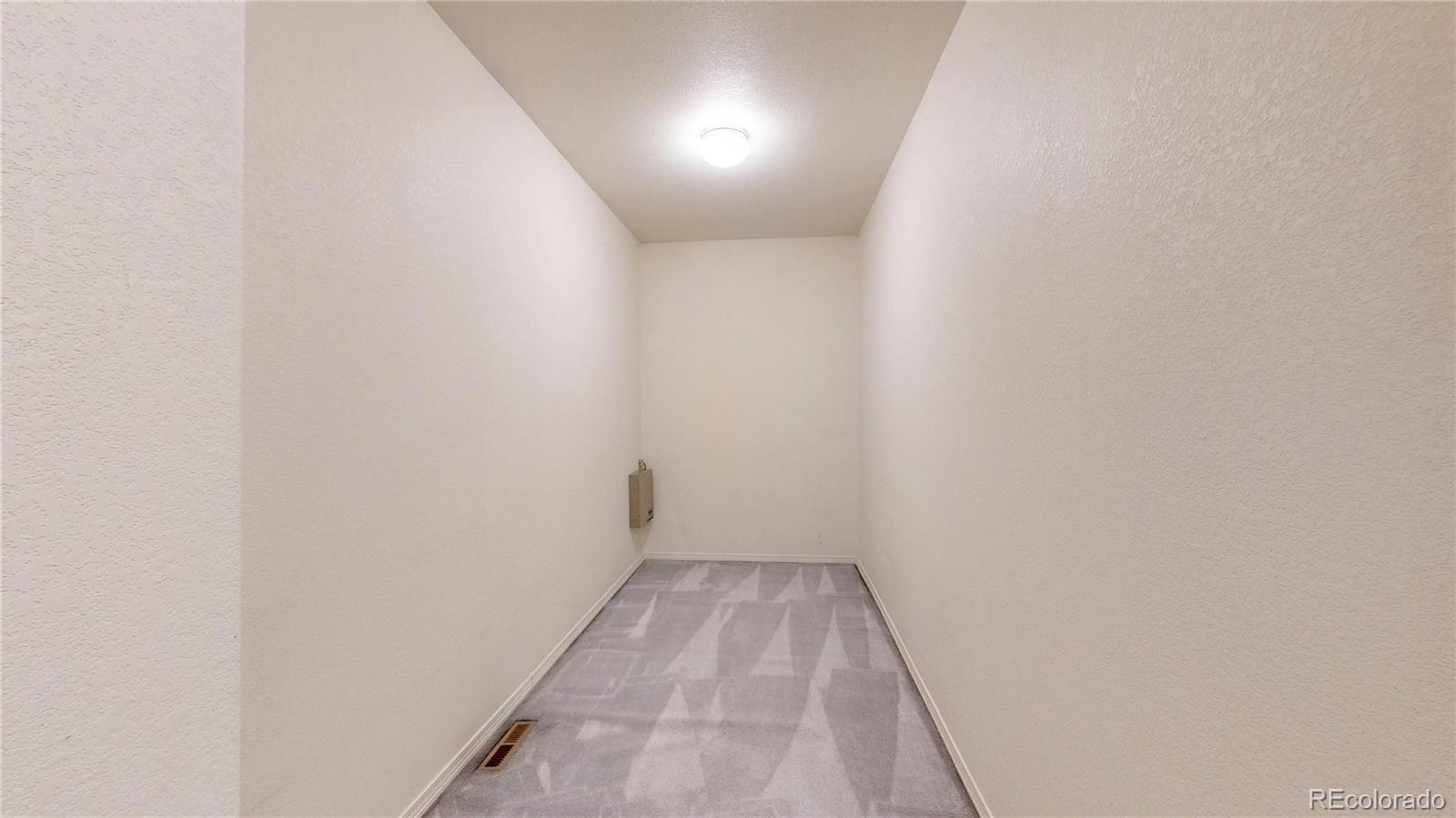 4367 Quail Street Wheat Ridge, CO 80033 - Photo 39 of 50 a view of a hallway