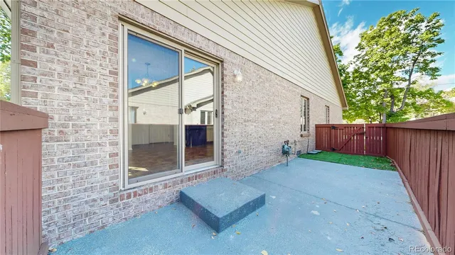 a view of a back yard of the house