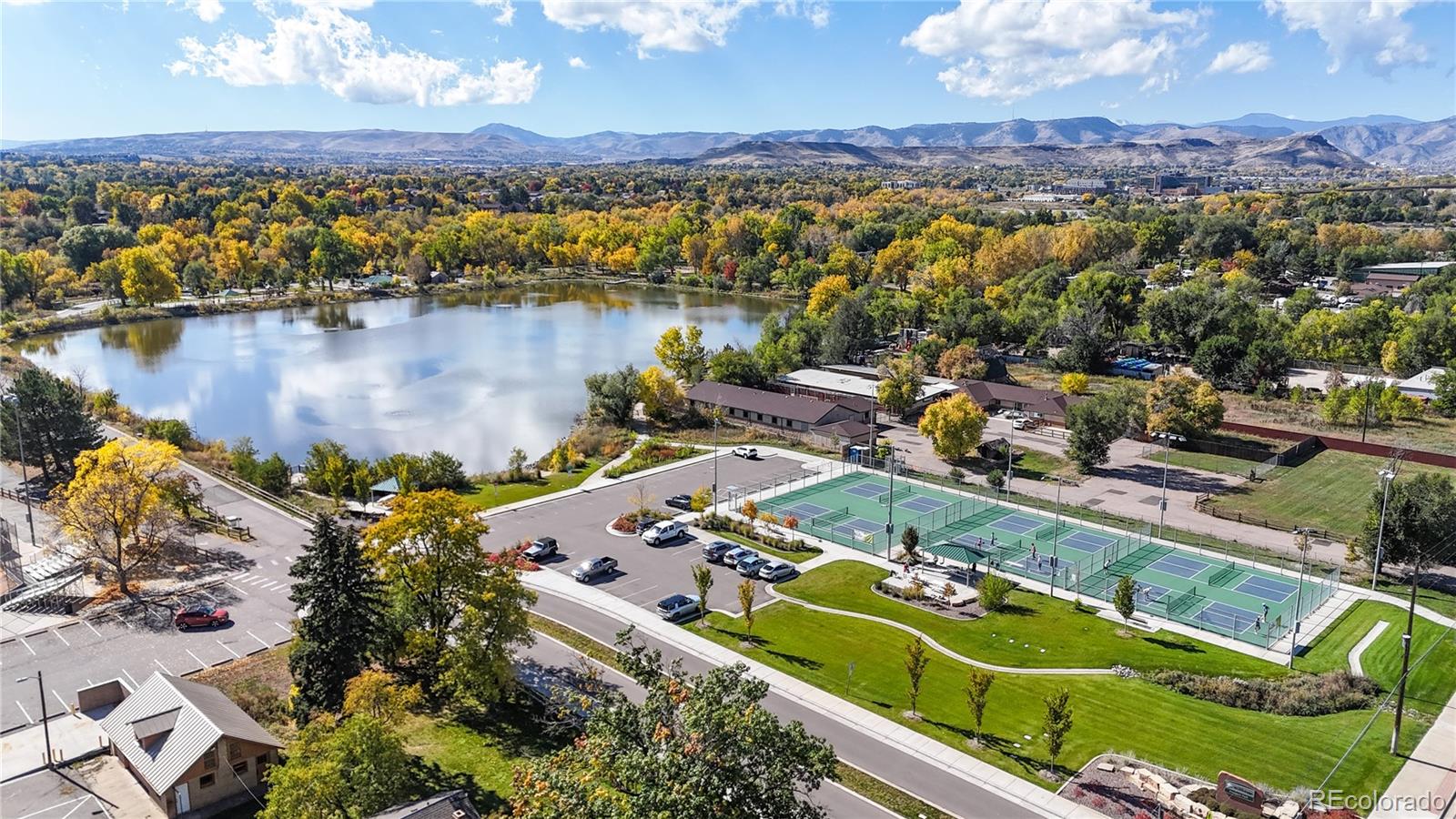 4367 Quail Street Wheat Ridge, CO 80033 - Photo 50 of 50 an aerial view of a house with a lake