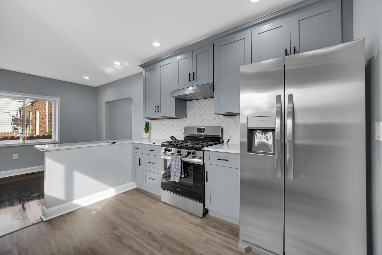 1430 Stanton Avenue Whiting, IN 46394 - Photo 2 of 17 a kitchen with a refrigerator and a sink