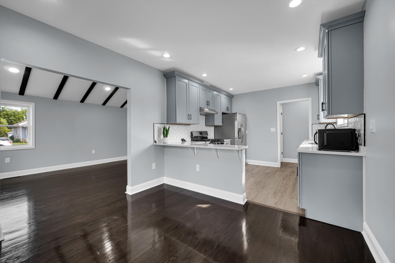 1430 Stanton Avenue Whiting, IN 46394 - Photo 4 of 17 a kitchen with stainless steel appliances granite countertop a refrigerator a stove and a sink