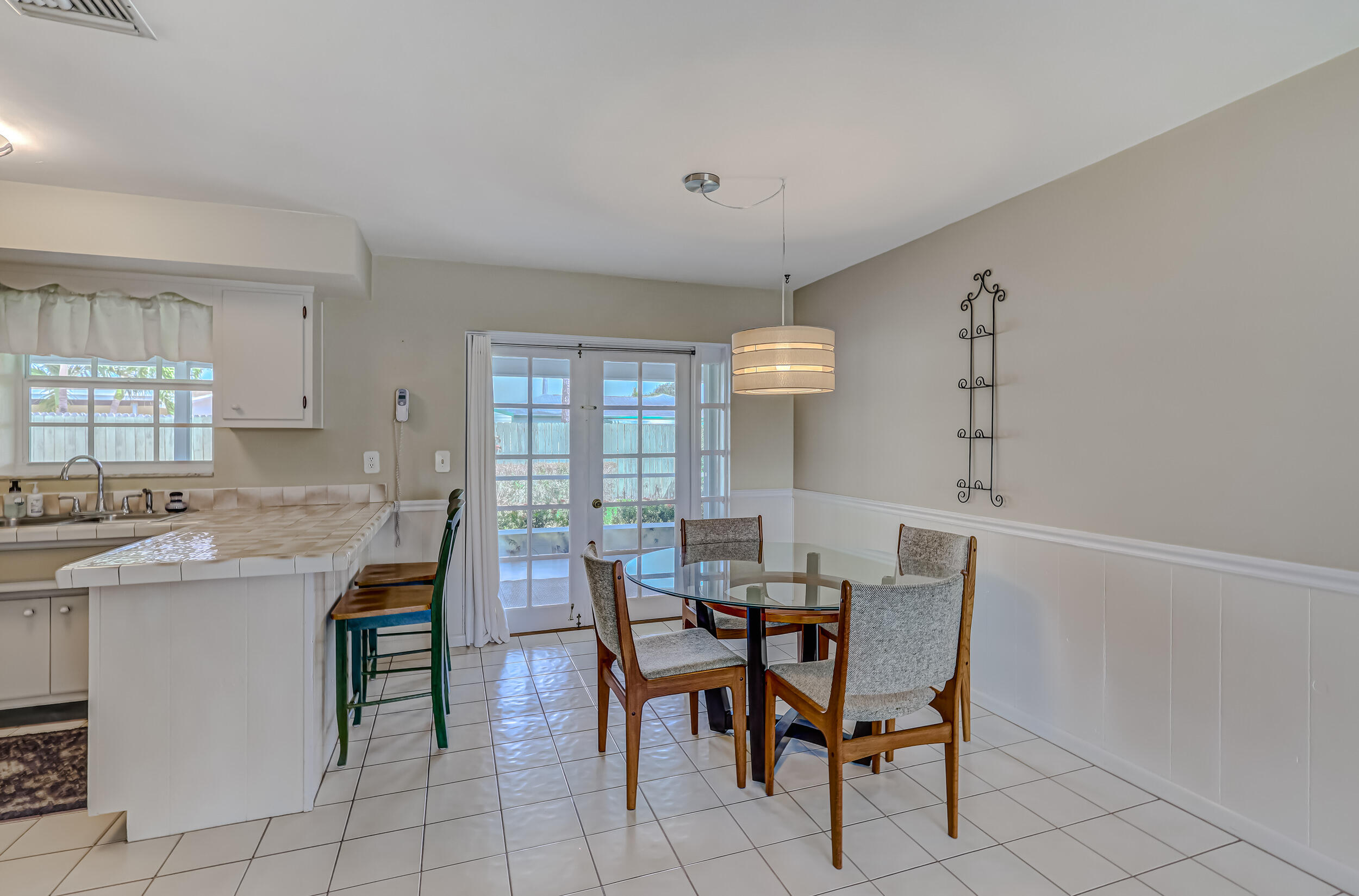 1618 Maypop Road West Palm Beach, FL 33415 - Photo 29 of 81 a view of a dining room with furniture