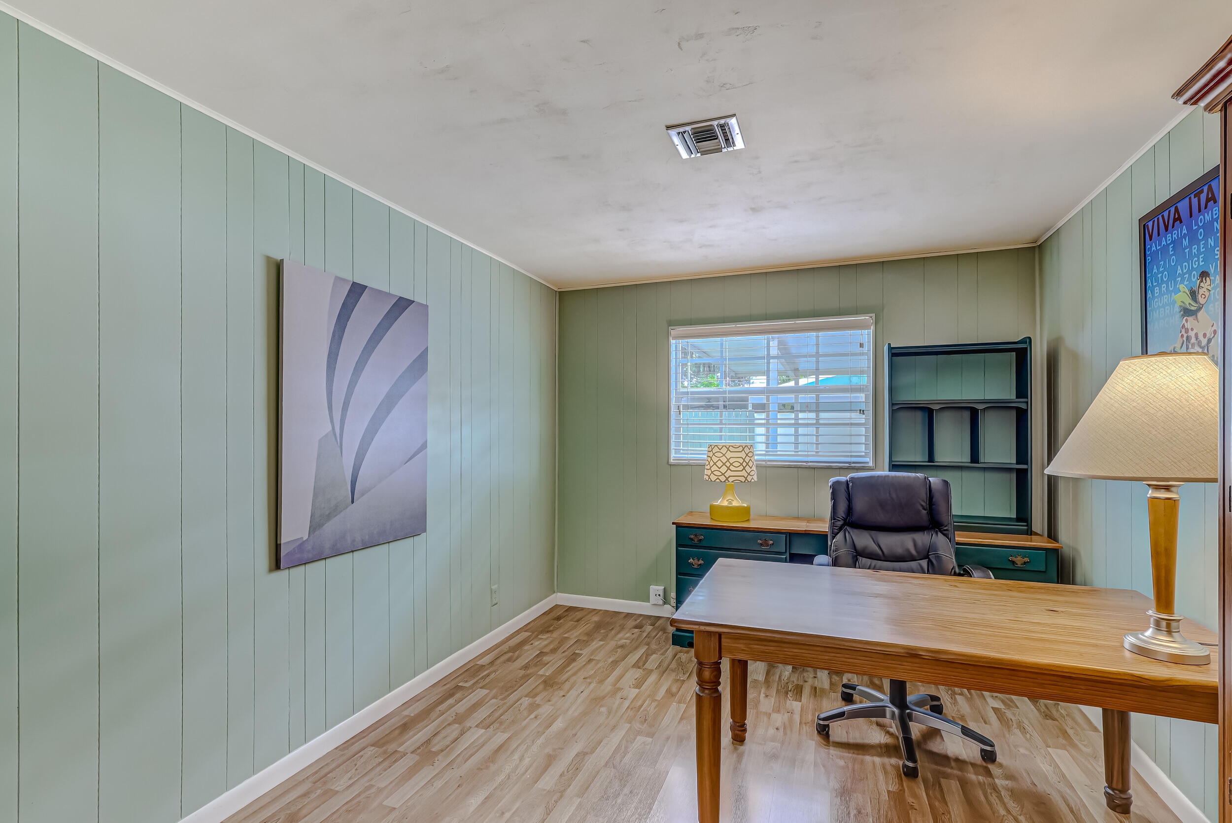 1618 Maypop Road West Palm Beach, FL 33415 - Photo 31 of 81 a workspace with furniture and a window