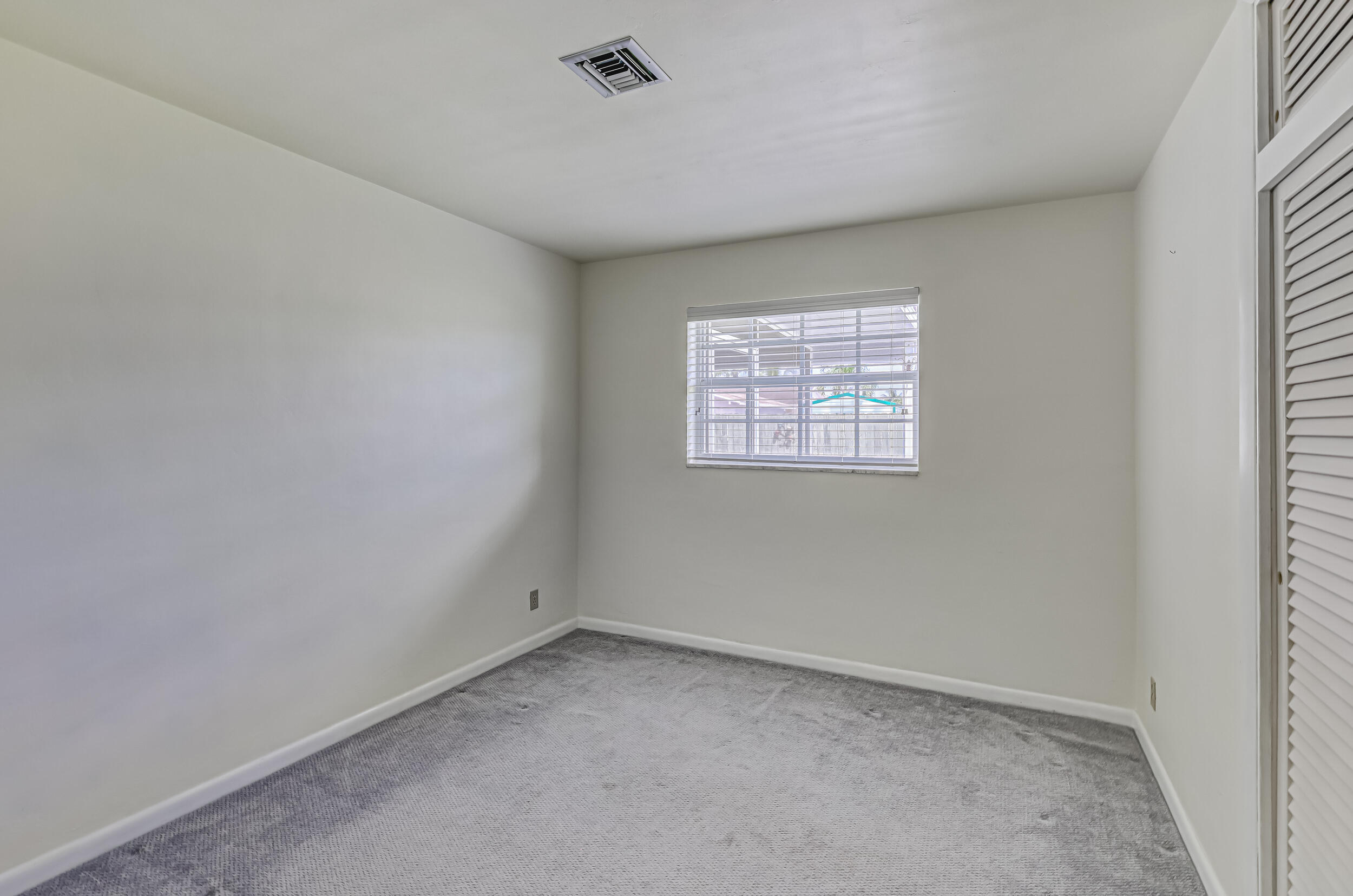 1618 Maypop Road West Palm Beach, FL 33415 - Photo 33 of 81 an empty room with windows
