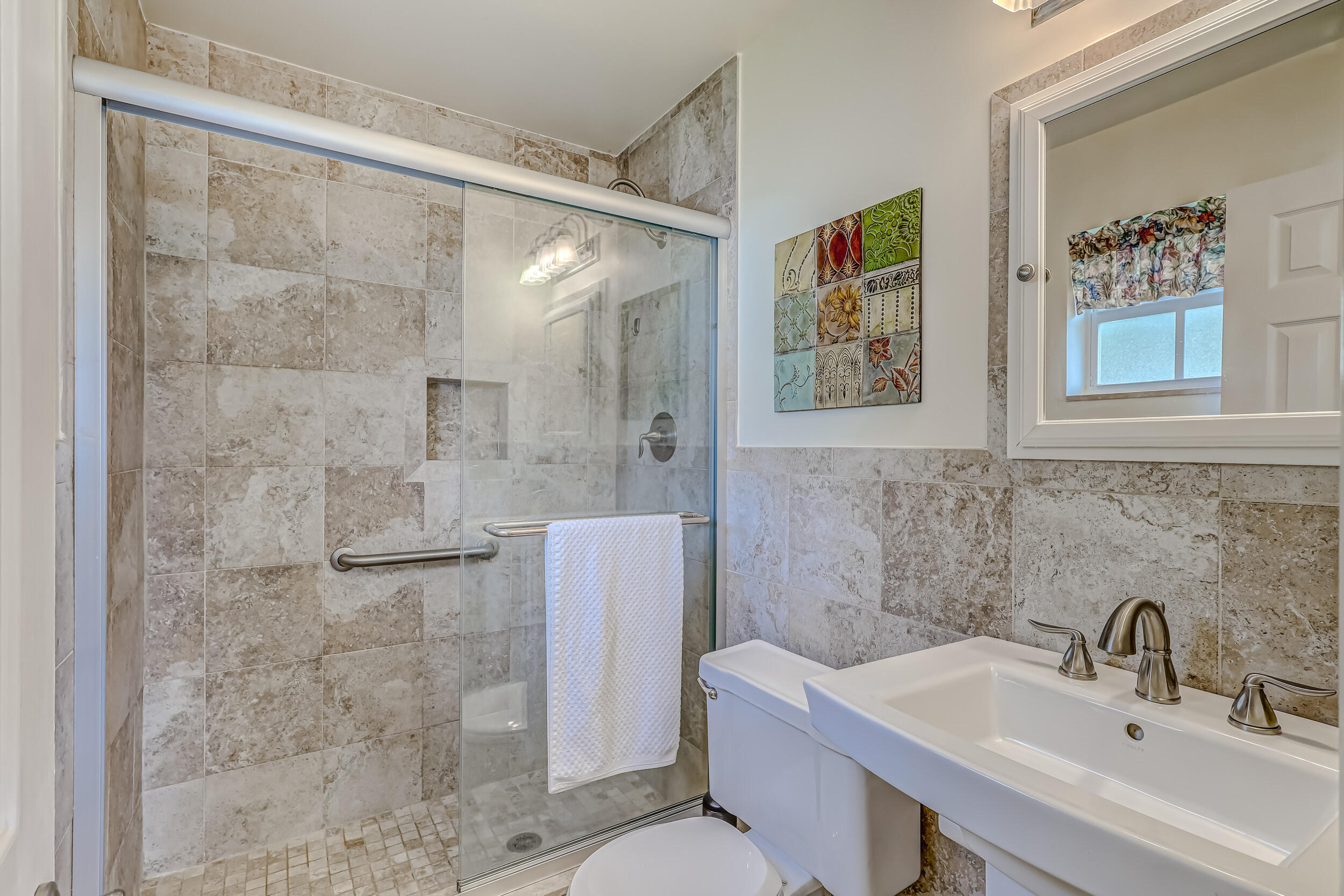 1618 Maypop Road West Palm Beach, FL 33415 - Photo 42 of 81 a bathroom with a sink and a shower