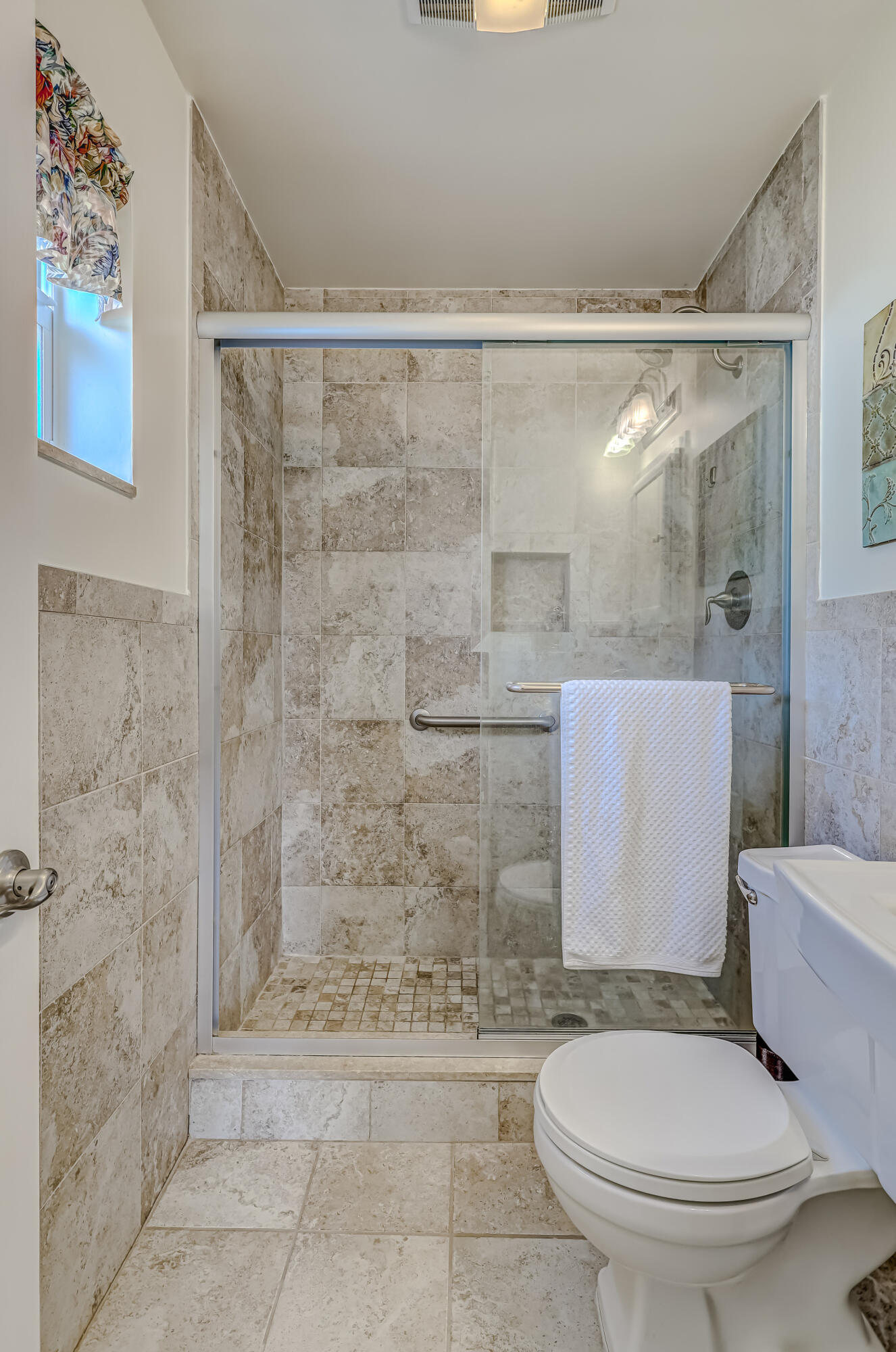 1618 Maypop Road West Palm Beach, FL 33415 - Photo 43 of 81 a bathroom with a toilet and a shower