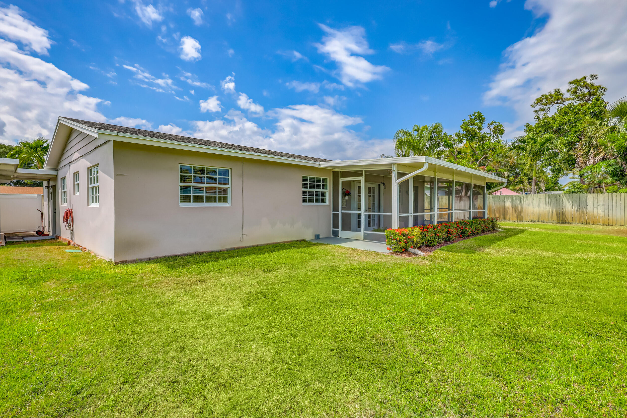 1618 Maypop Road West Palm Beach, FL 33415 - Photo 56 of 81 a view of a house with backyard and sitting area