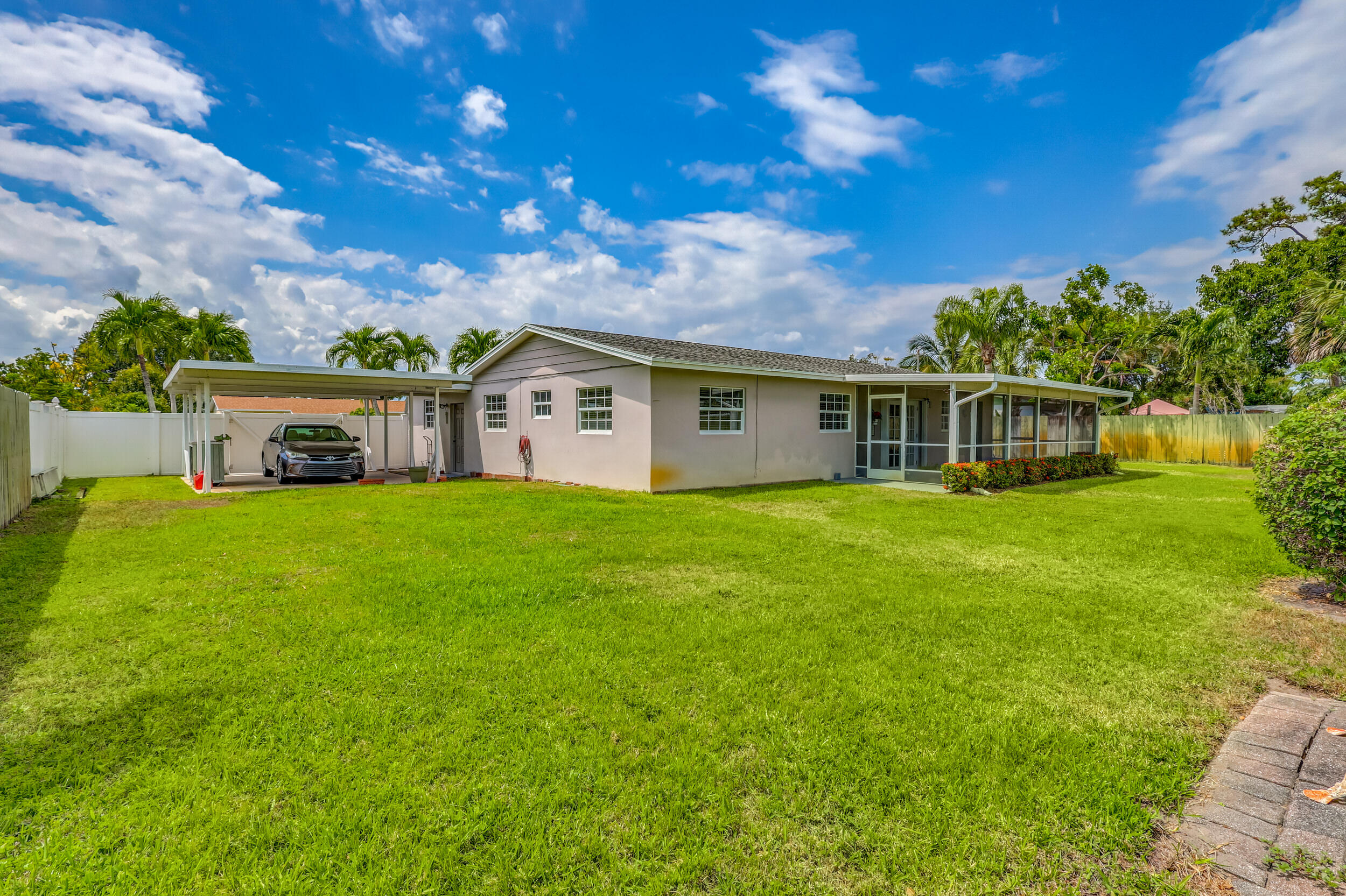 1618 Maypop Road West Palm Beach, FL 33415 - Photo 58 of 81 a house view with a garden space