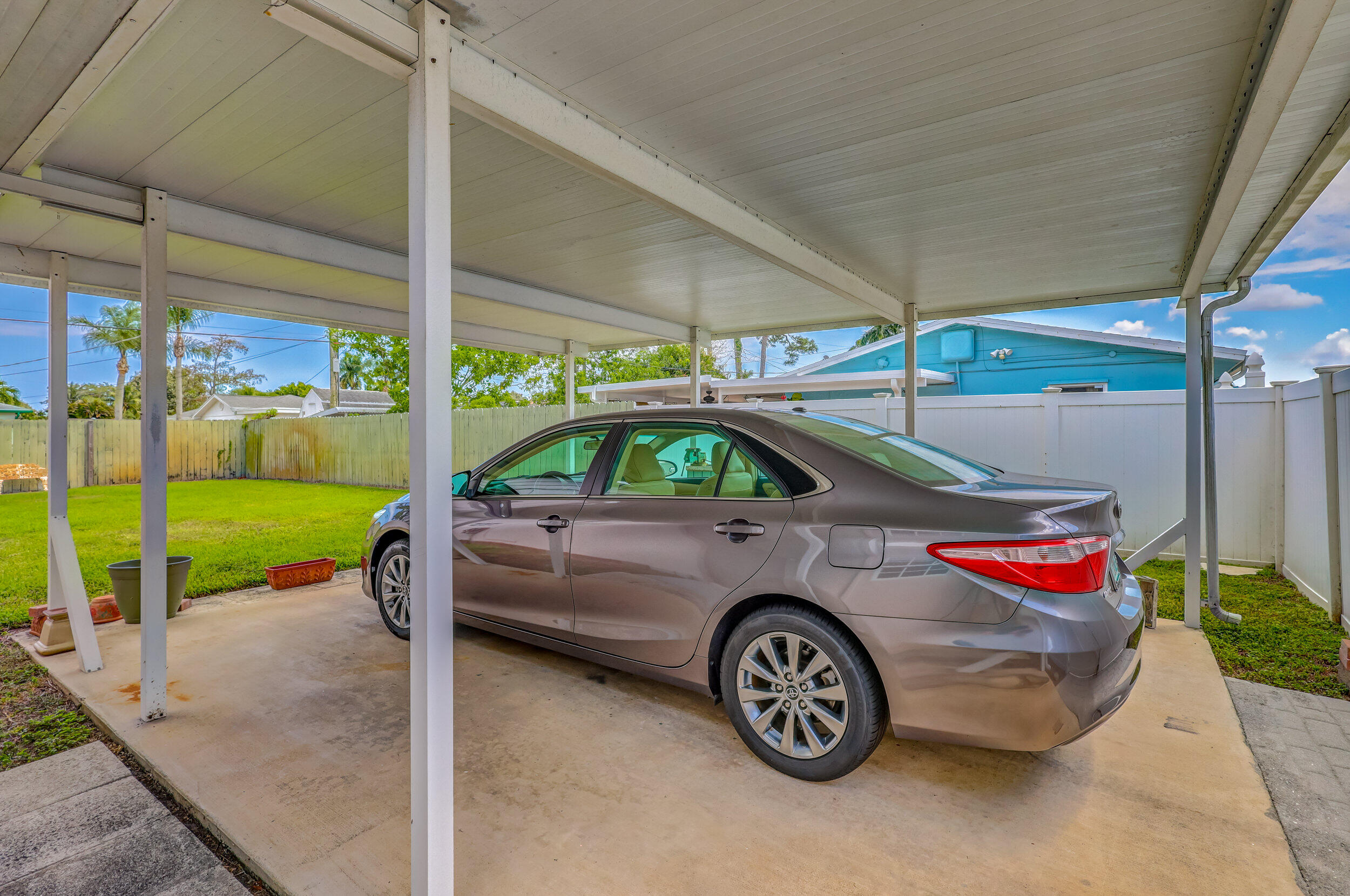 1618 Maypop Road West Palm Beach, FL 33415 - Photo 62 of 81 a car parked on the side of the road