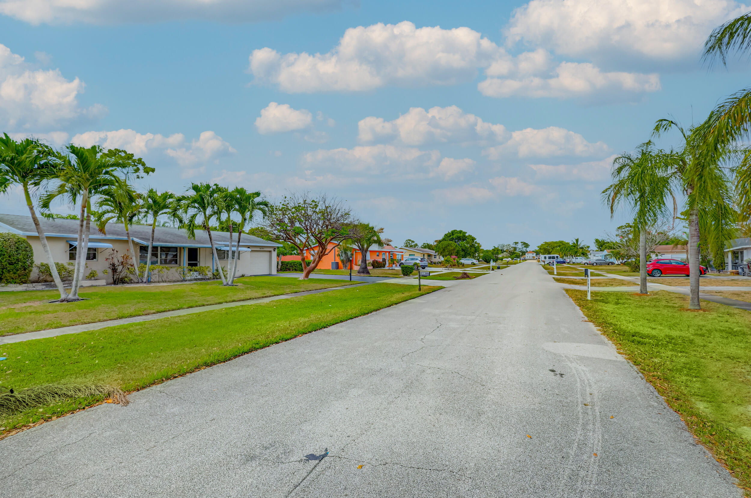 1618 Maypop Road West Palm Beach, FL 33415 - Photo 66 of 81 a view of building with outdoor space
