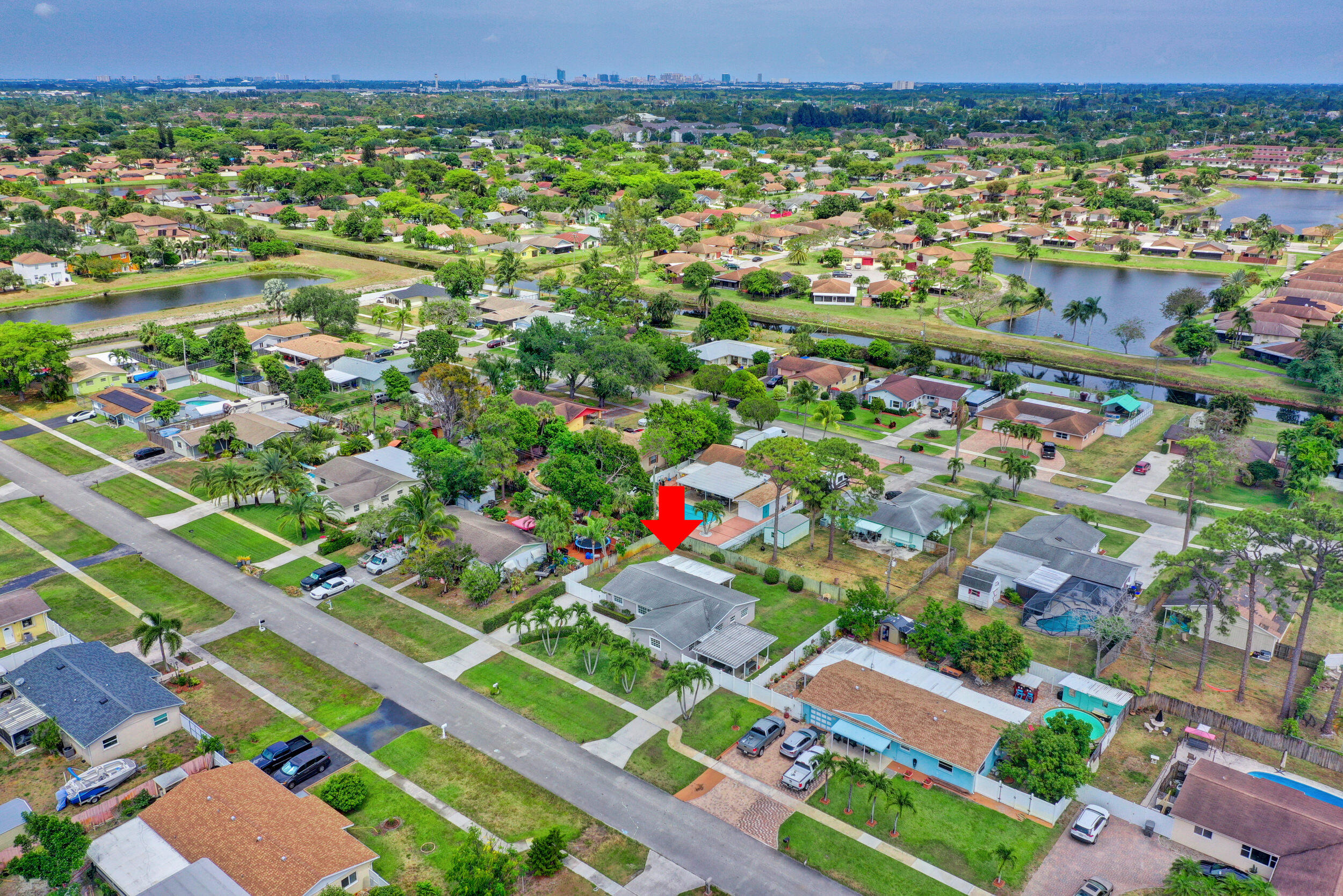 1618 Maypop Road West Palm Beach, FL 33415 - Photo 73 of 81 an aerial view of residential houses with outdoor space and street view