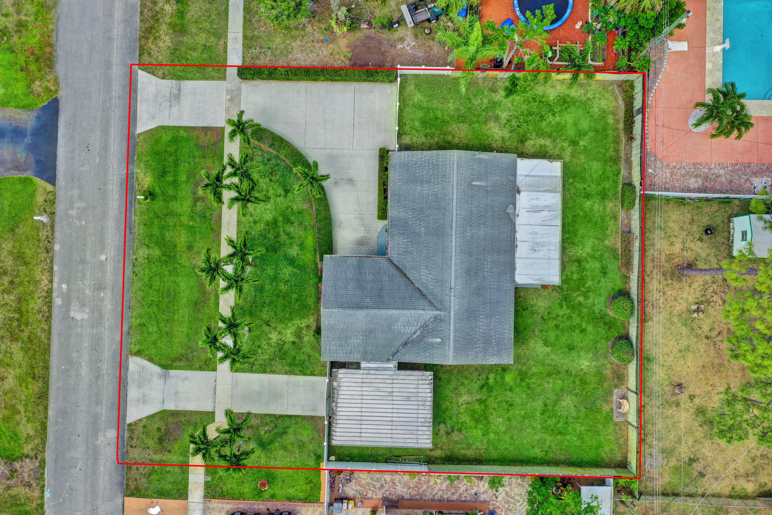 1618 Maypop Road West Palm Beach, FL 33415 - Photo 81 of 81 an aerial view of a house with a yard