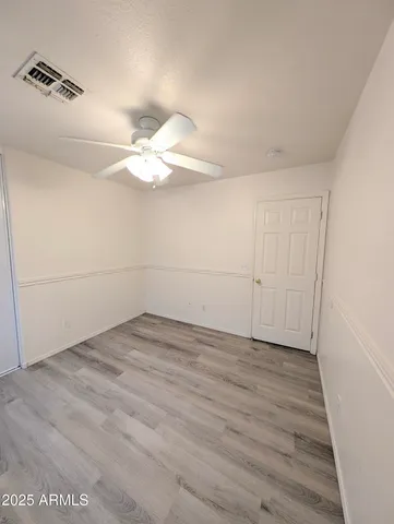 a bathroom with a sink vanity and mirror