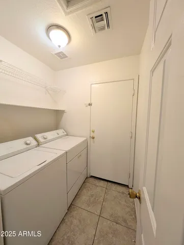 a view of empty room with front door