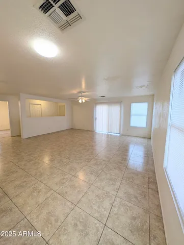 a view of an empty room and window