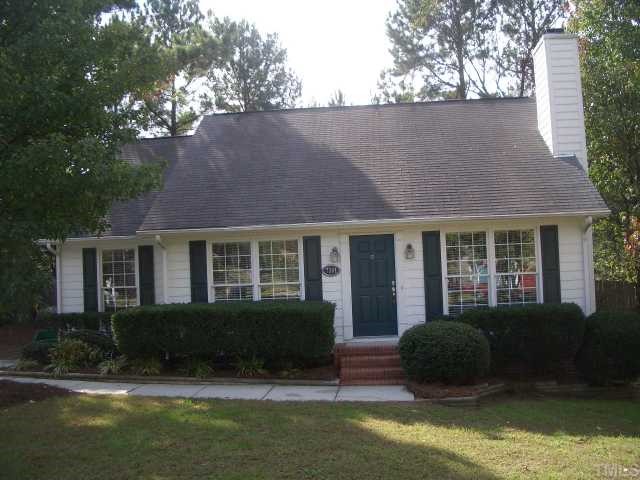 7301 Massachusetts Court Raleigh, NC 27615 - Photo 1 of 12 a view of a house with a swimming pool