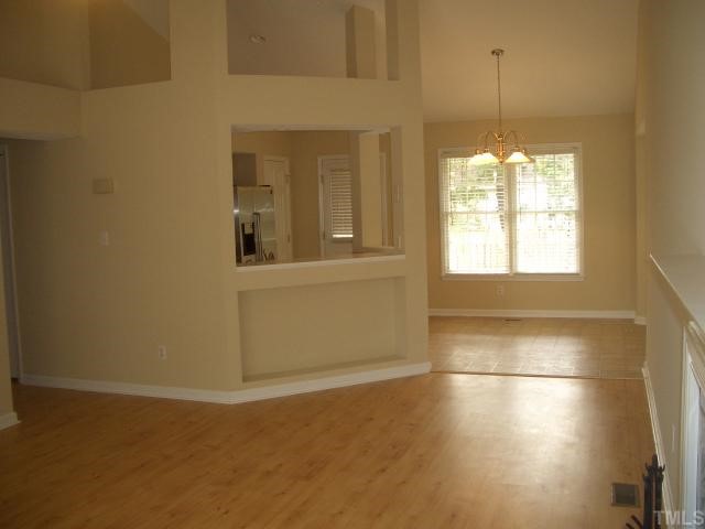 7301 Massachusetts Court Raleigh, NC 27615 - Photo 3 of 12 a view of a livingroom with a window