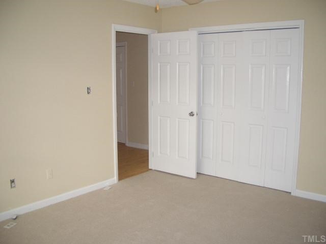 7301 Massachusetts Court Raleigh, NC 27615 - Photo 8 of 12 a view of an empty room
