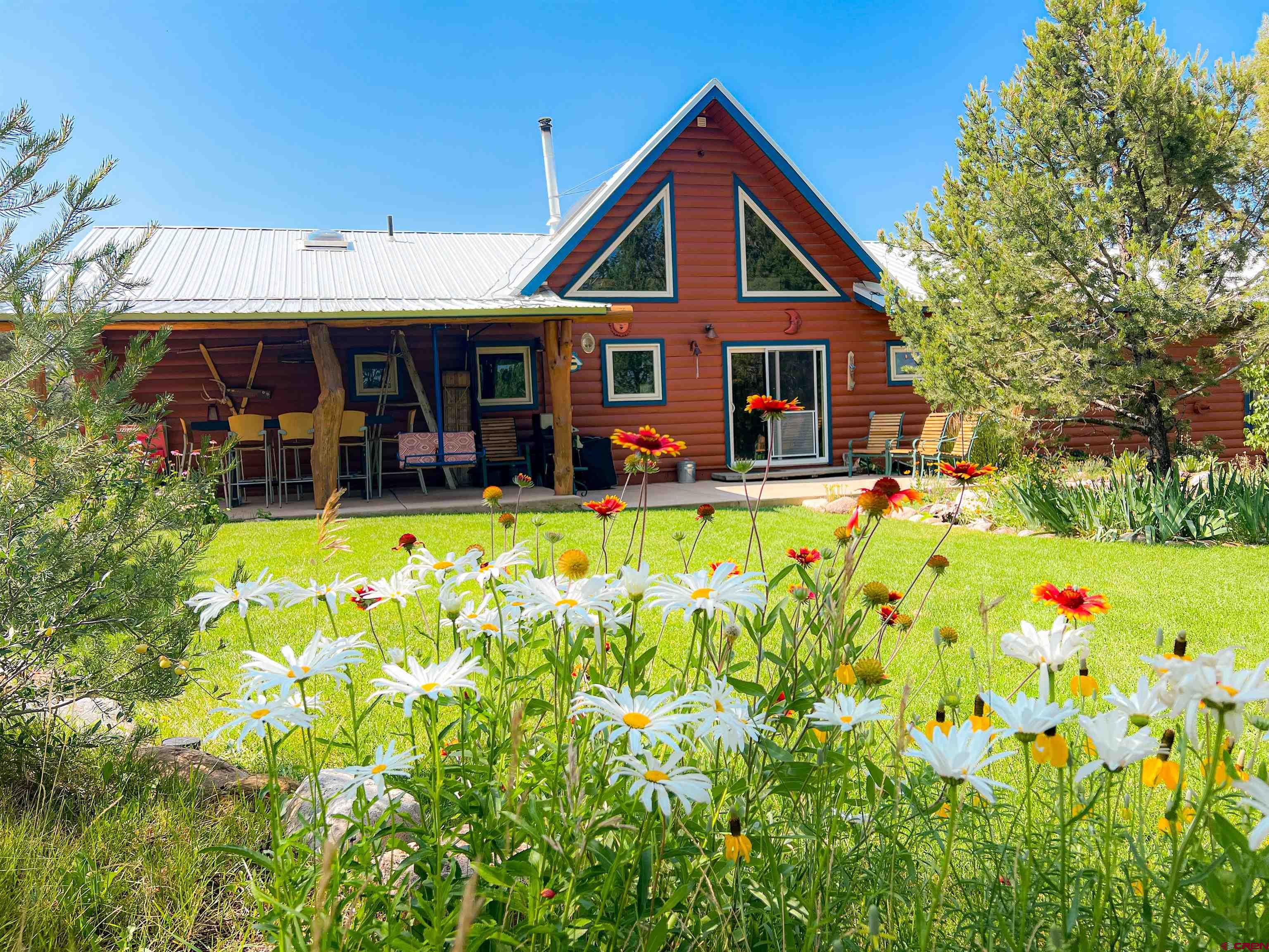 349 Mariposa Drive Durango, CO 81301 - Photo 2 of 34 a view of a house with swimming pool