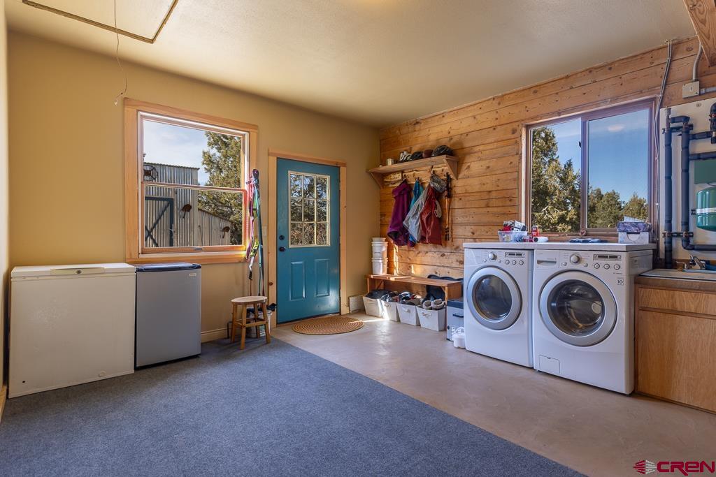 349 Mariposa Drive Durango, CO 81301 - Photo 21 of 34 a view of a storage & utility room with washer and dryer
