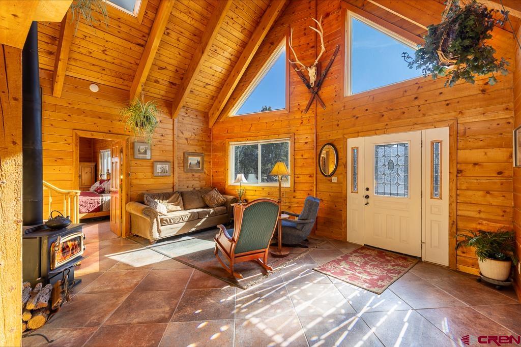 349 Mariposa Drive Durango, CO 81301 - Photo 7 of 34 a backyard of a house with barbeque oven table and chairs