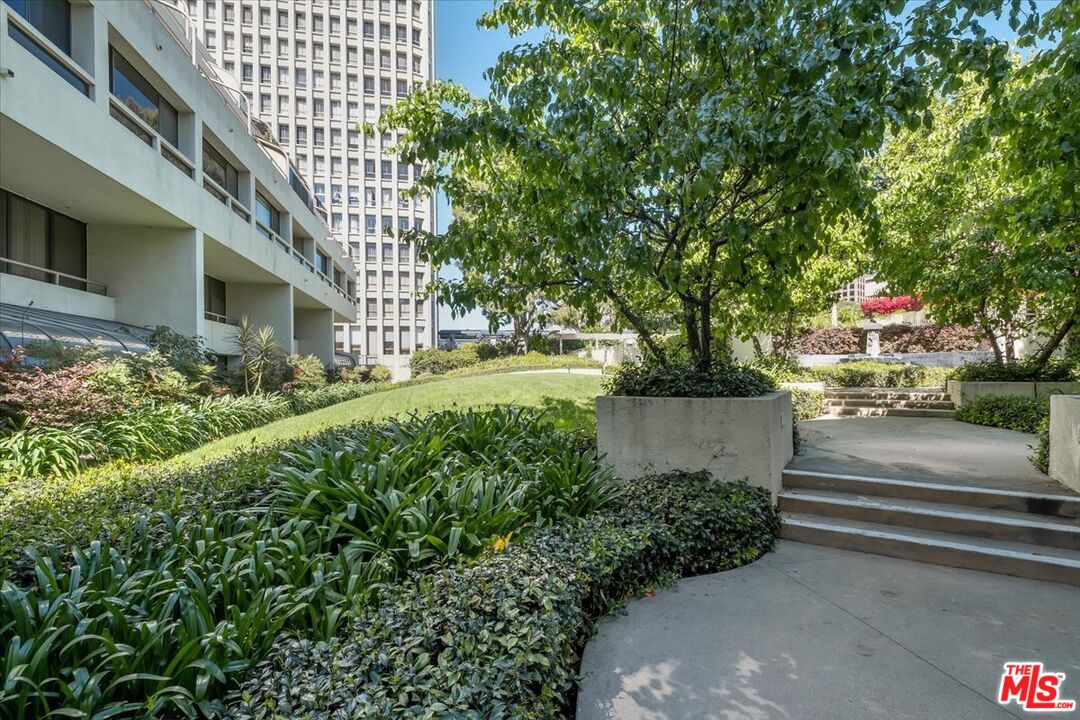 121 South Hope Street, Unit 313 Los Angeles, CA 90012 - Photo 21 of 35 a view of a garden with pathway