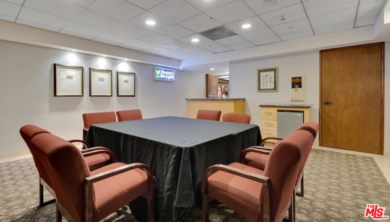 121 South Hope Street, Unit 313 Los Angeles, CA 90012 - Photo 28 of 35 a view of a dining room with furniture