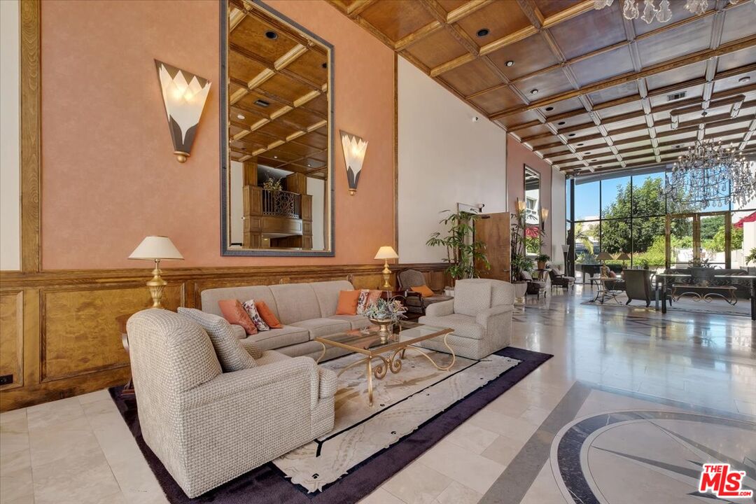 121 South Hope Street, Unit 313 Los Angeles, CA 90012 - Photo 30 of 35 a living room with furniture