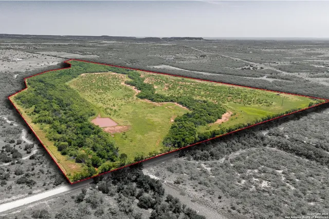 a view of a large body of water and mountain