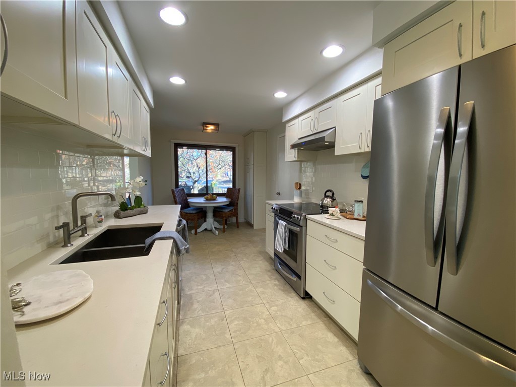 1024 Canyon View Road Northfield, OH 44067 - Photo 19 of 38 Updated kitchen with white shaker cabinets