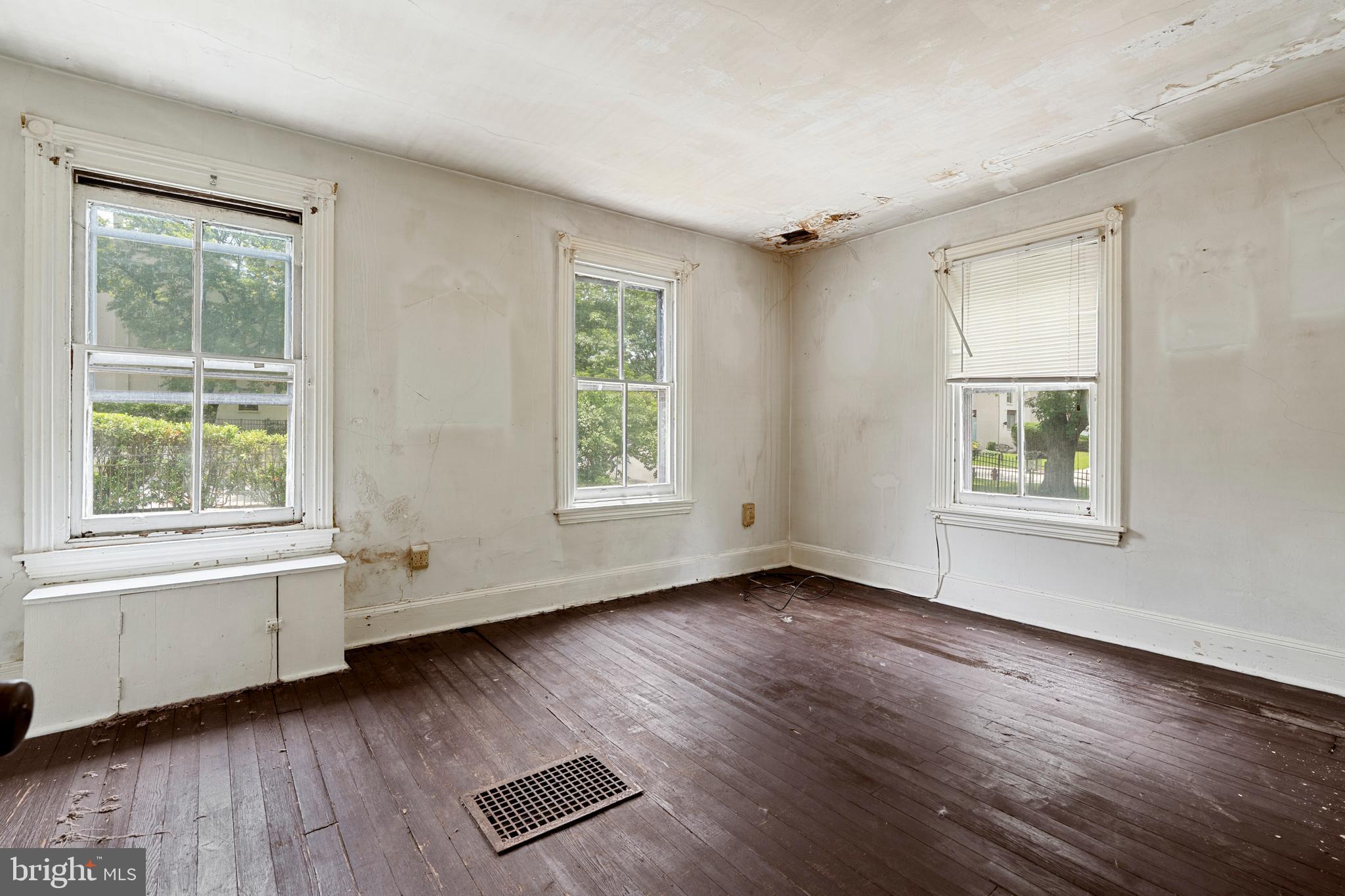 527 Berwyn Baptist Road Devon, PA 19333 - Photo 13 of 20 a view of an empty room with wooden floor and a window
