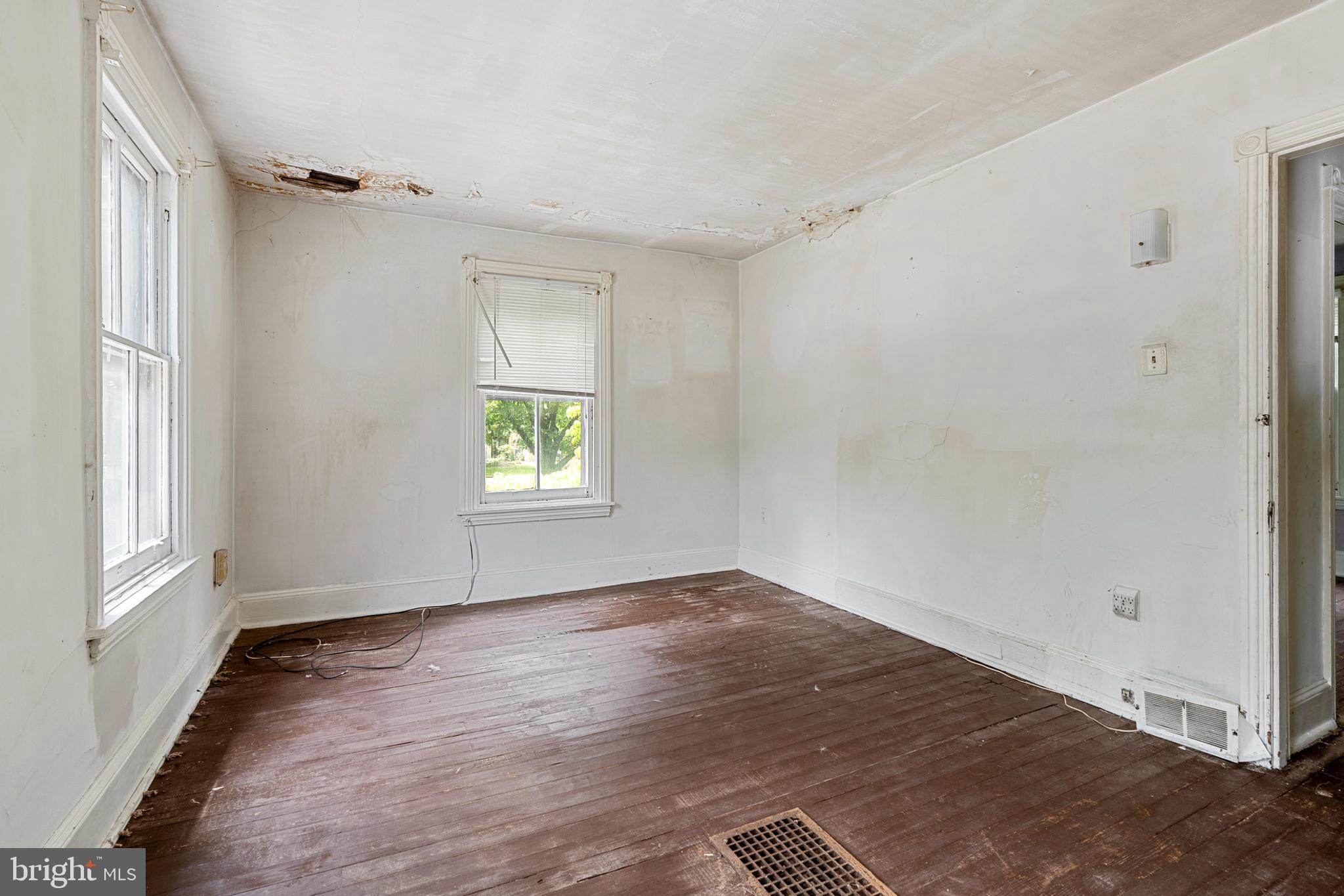 527 Berwyn Baptist Road Devon, PA 19333 - Photo 14 of 20 an empty room with wooden floor and windows