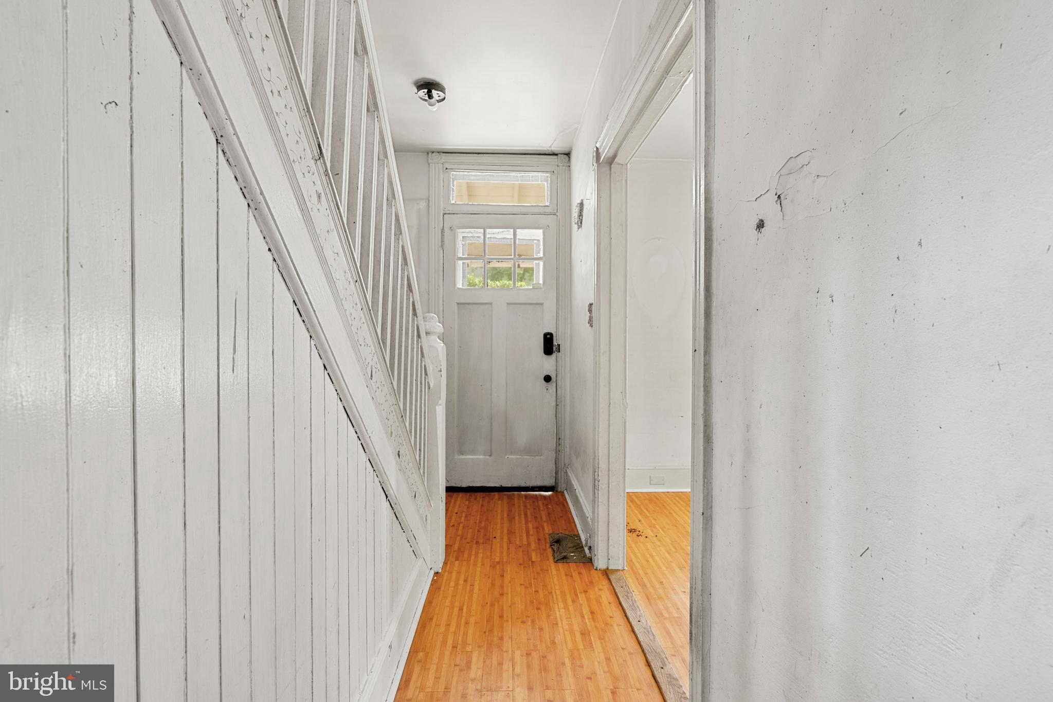 527 Berwyn Baptist Road Devon, PA 19333 - Photo 4 of 20 a view of a hallway with wooden floor and staircase