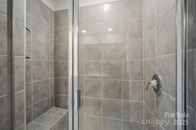 a view of storage and utility room with washer and dryer