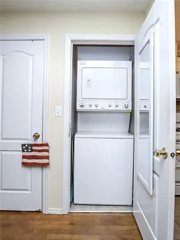 a room with a bench and cabinets