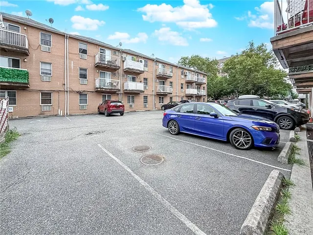 a car parked in front of a building