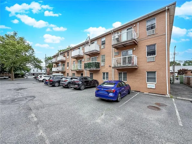 a car parked in front of a building