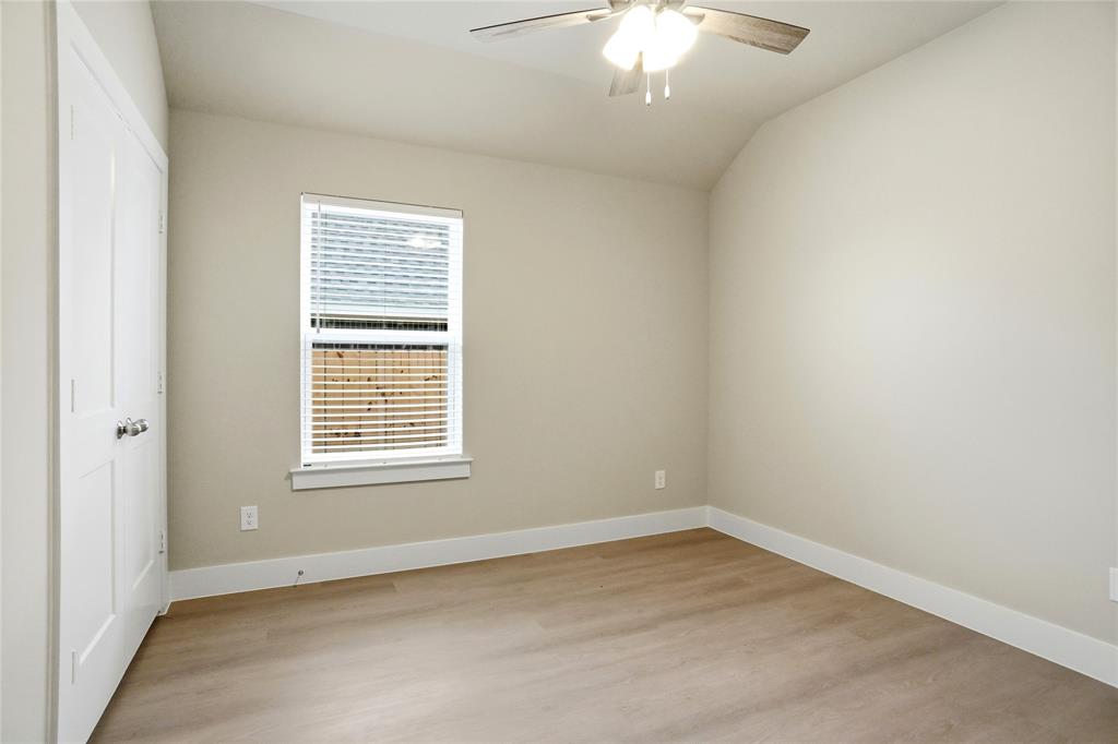 133 Joel Street Springtown, TX 76082 - Photo 11 of 15 an empty room with a window