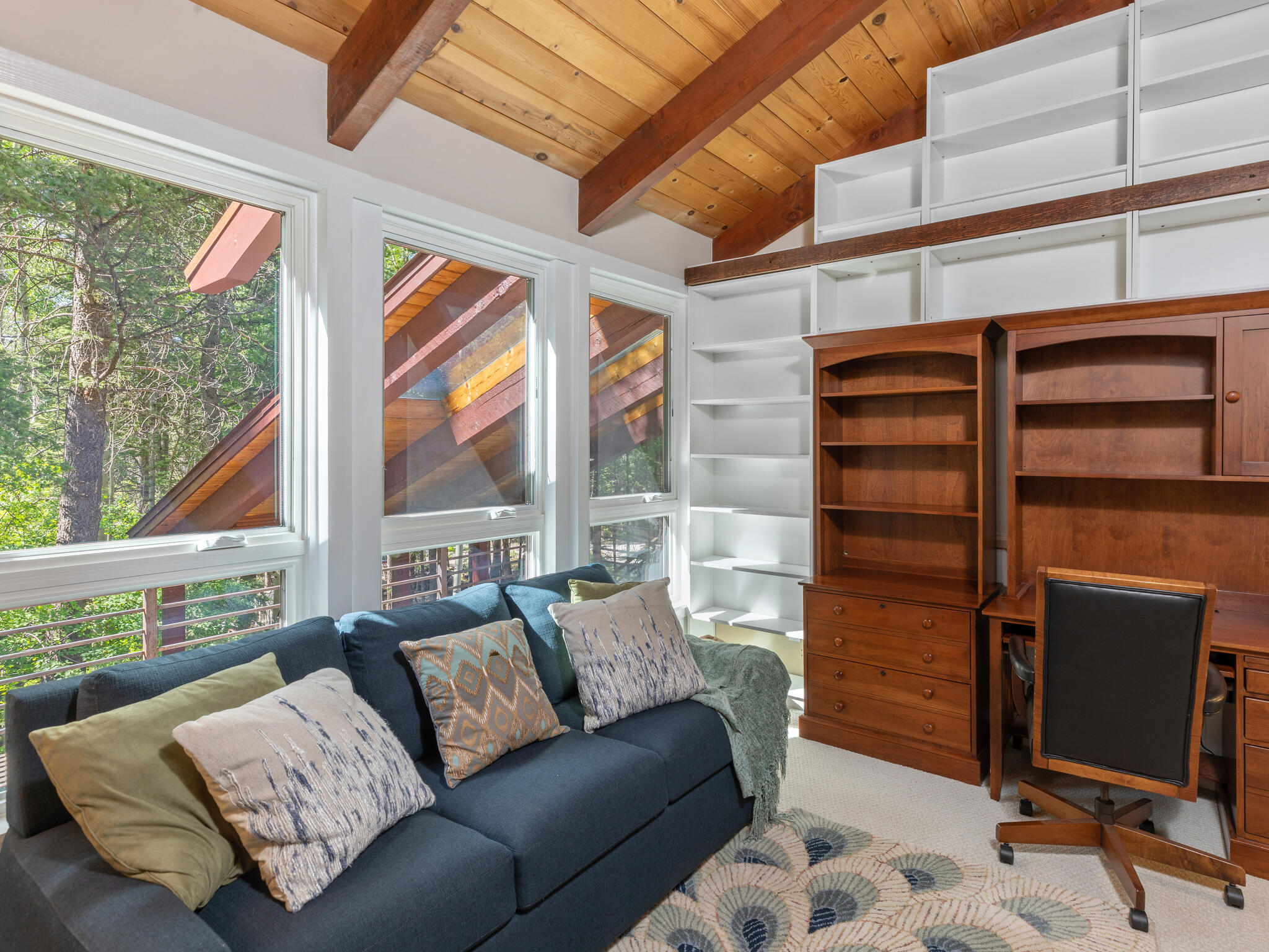 226 Lake Fork Junction Road Ophir, CO 81426 - Photo 22 of 31 a living room with furniture a large window