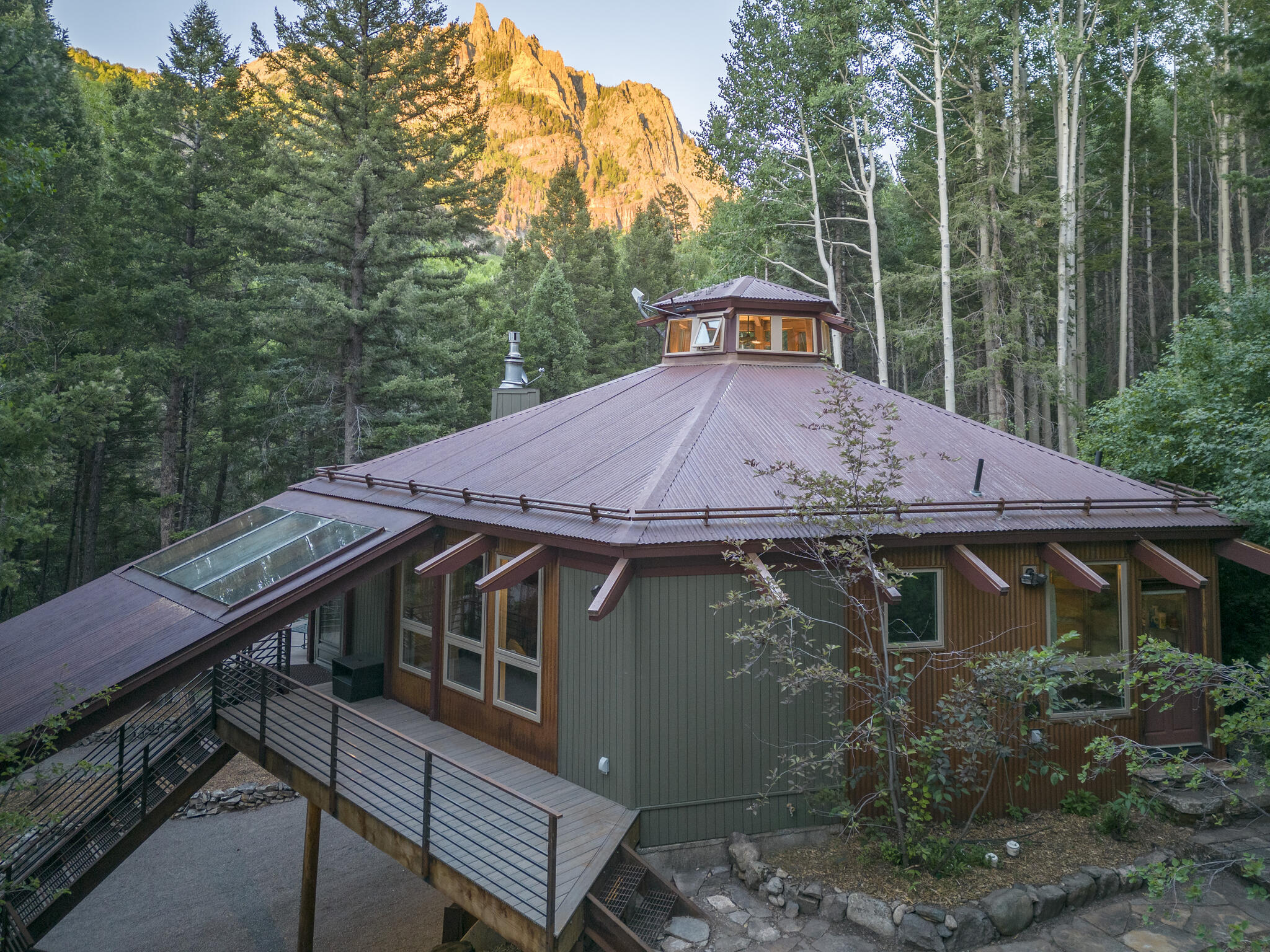 226 Lake Fork Junction Road Ophir, CO 81426 - Photo 28 of 31 a view of a house with a yard balcony and outdoor seating