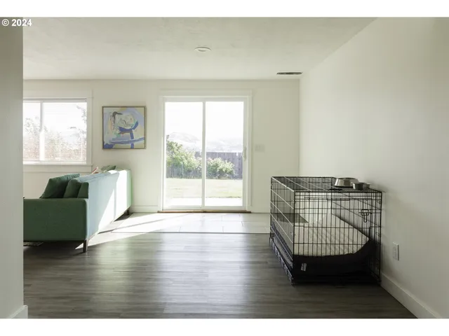 a view of workspace with furniture and window