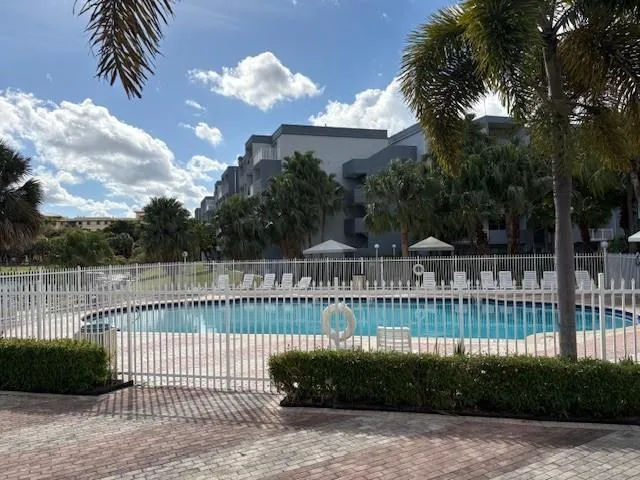 a view of a houses with a street
