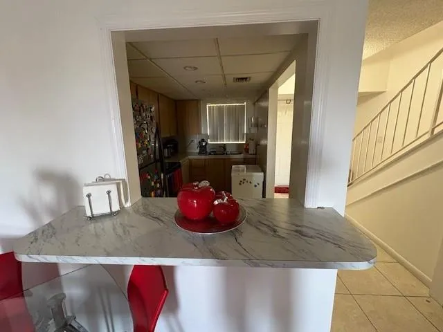 a view of a living room and dining room